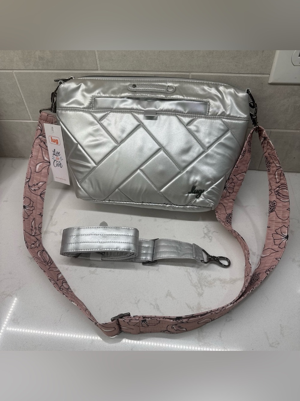 NWT lug Flare Metallic Silver Quilted Crossbody with Pink Floral & silver straps
